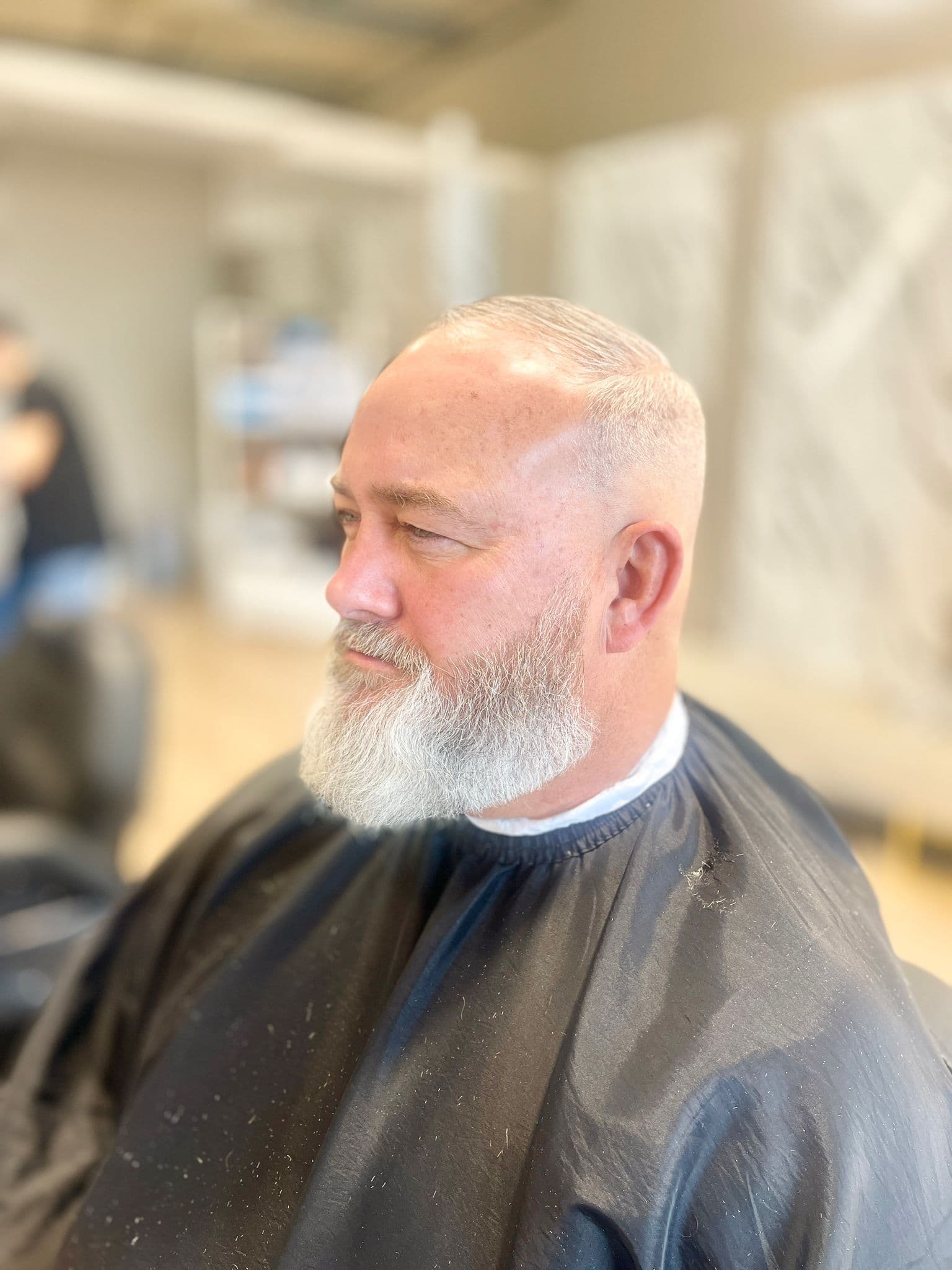 Neatly lined-up short beard