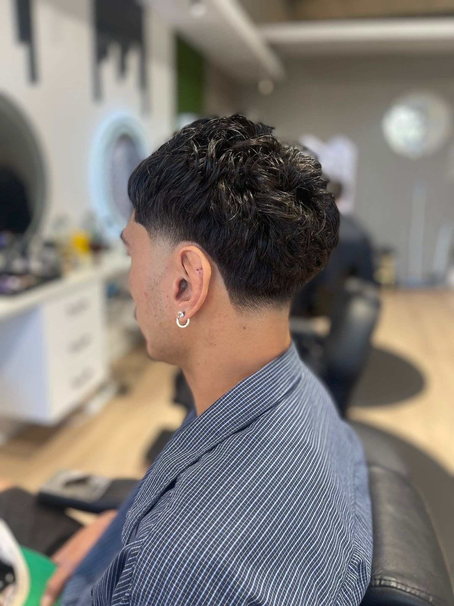 Young client with a zero fade and textured top